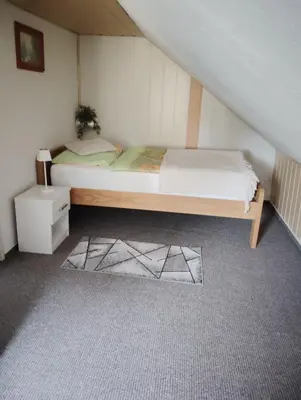 Ein Bett oder Betten in einem Zimmer der Unterkunft Ferienhaus Schlenker