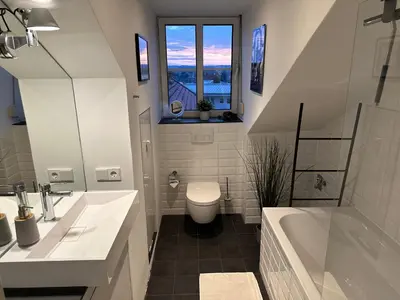 Ein Badezimmer in der Unterkunft Oasis Appart - Wohnen am Elbtal Dresden - Balkon - Netflix - Tiefgarage