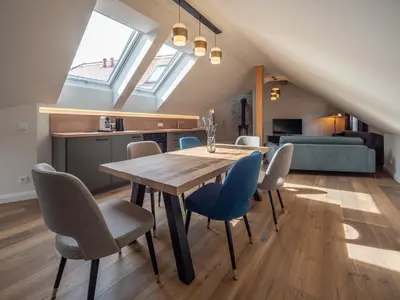 Ein Sitzbereich in der Unterkunft Alte Bäckerei Königstein Aparthotel und Café