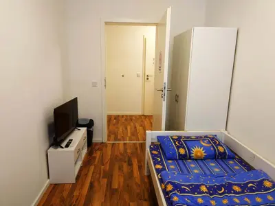 Ein Bett oder Betten in einem Zimmer der Unterkunft Ruhige Monteurwohnung Freiberg
