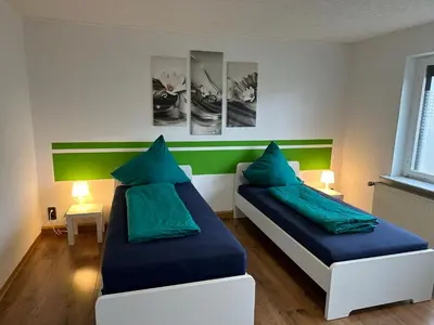 Ein Bett oder Betten in einem Zimmer der Unterkunft Pension „Haus 11“ Lauta