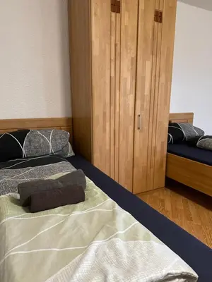 Ein Bett oder Betten in einem Zimmer der Unterkunft Pension „Haus 11“ Lauta