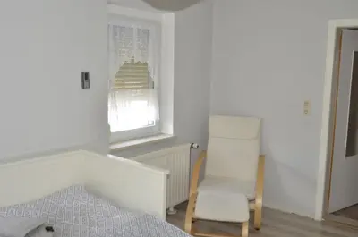 Ein Bett oder Betten in einem Zimmer der Unterkunft Ferienhaus Erika