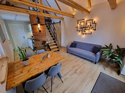 Ein Sitzbereich in der Unterkunft Ferienhaus-DP8