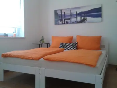 Ein Bett oder Betten in einem Zimmer der Unterkunft Kleine Apartments