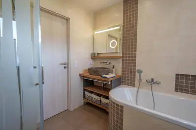 Ein Badezimmer in der Unterkunft HERZstück Erzgebirge