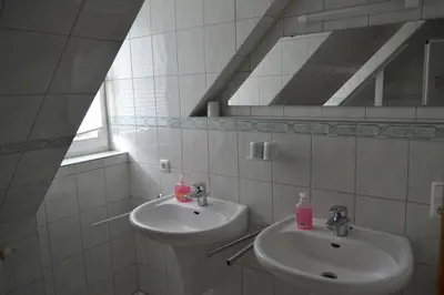Ein Badezimmer in der Unterkunft Großzügiges Ferienhaus nahe Rochlitz