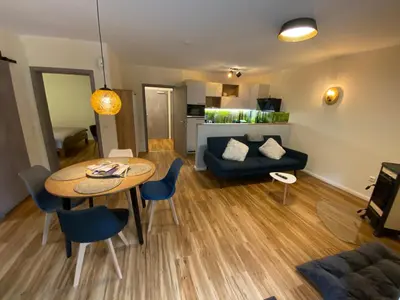 Ein Sitzbereich in der Unterkunft Luxuriöses Ferienapartment A2 mit umzäunten Garten, 55qm