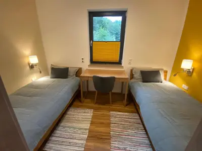 Ein Sitzbereich in der Unterkunft Luxuriöses Ferienapartment A2 mit umzäunten Garten, 55qm