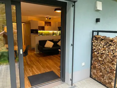 Ein Bett oder Betten in einem Zimmer der Unterkunft Luxuriöses Ferienapartment A2 mit umzäunten Garten, 55qm