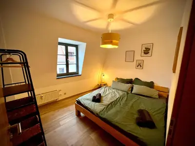 Ein Bett oder Betten in einem Zimmer der Unterkunft Altstadt Lounge Pirna with PARKING