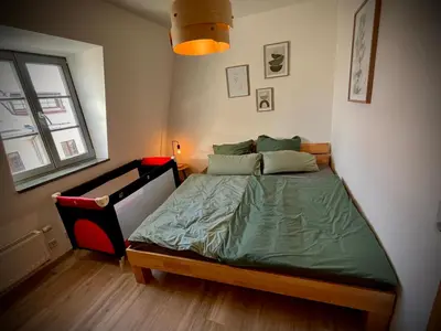 Ein Bett oder Betten in einem Zimmer der Unterkunft Altstadt Lounge Pirna with PARKING