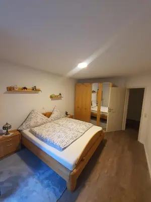 Ein Bett oder Betten in einem Zimmer der Unterkunft Dennis Apartment