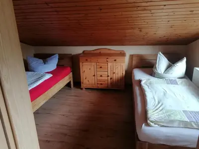 Ein Bett oder Betten in einem Zimmer der Unterkunft Weidmannsruh Apartment für 2 bis 3 Personen