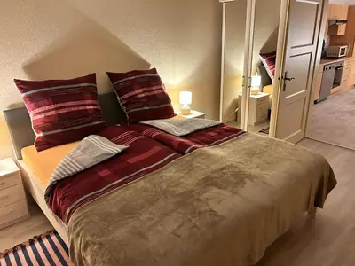 Ein Bett oder Betten in einem Zimmer der Unterkunft Schlossblick und Komfort in Stolpen