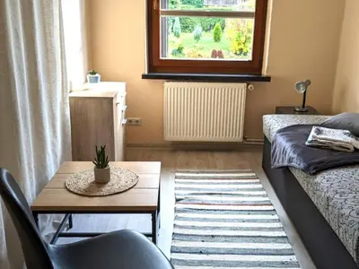 Ein Bett oder Betten in einem Zimmer der Unterkunft Schlossblick und Komfort in Stolpen