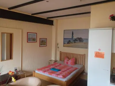 Ein Bett oder Betten in einem Zimmer der Unterkunft City Pension Senftenberg / Apartment Nr.1