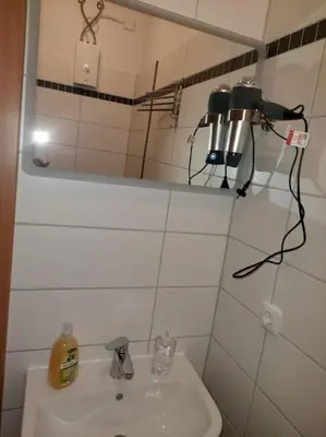 Ein Badezimmer in der Unterkunft City Pension Senftenberg / Apartment Nr.1