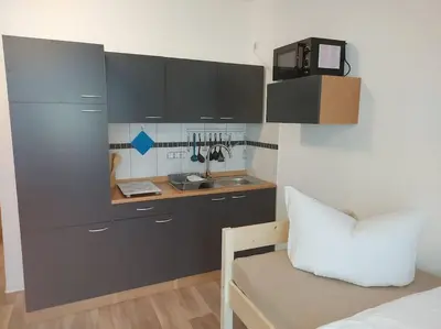 Küche/Küchenzeile in der Unterkunft City Pension Senftenberg / Apartment Nr.1