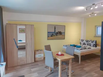 Ein Sitzbereich in der Unterkunft City Pension Senftenberg / Apartment Nr.1