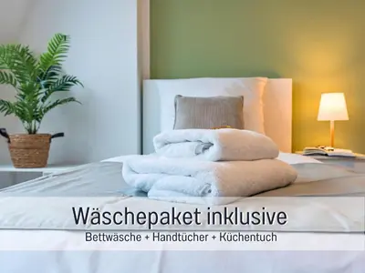 Ein Bett oder Betten in einem Zimmer der Unterkunft BENVILLE BV04 - Nespresso Kaffee - Zentral - WLAN - Küche & Spülmaschine - Waschmaschine