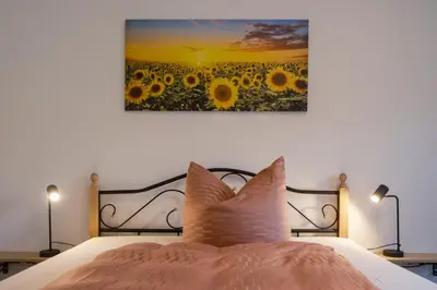 Ein Bett oder Betten in einem Zimmer der Unterkunft Ferien & Fasten Pension Haus am Picho