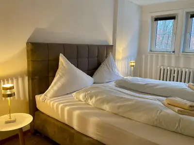 Ein Bett oder Betten in einem Zimmer der Unterkunft Kavaliershaus neben Schloss Rauenstein