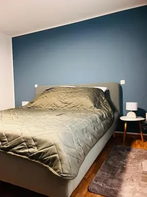 Ein Bett oder Betten in einem Zimmer der Unterkunft Ferienwohnung 09599 Freiberg in Sachsen nahe Bahnhof
