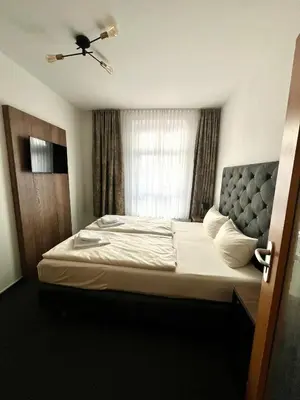 Ein Bett oder Betten in einem Zimmer der Unterkunft großes Familienapartment mit Blick zur Frauenkirche