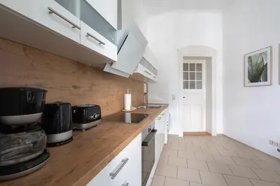 Küche/Küchenzeile in der Unterkunft Schloss - Apartments an der Uni - Klinik