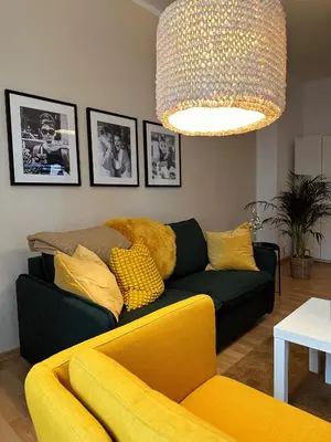 Ein Sitzbereich in der Unterkunft Victoria Apartment