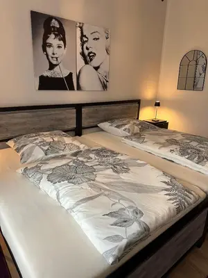 Ein Bett oder Betten in einem Zimmer der Unterkunft Victoria Apartment