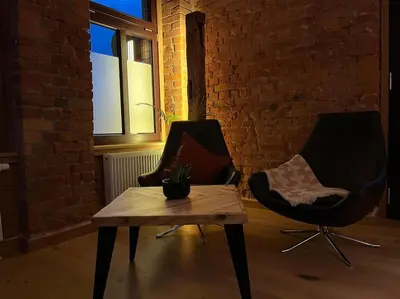Ein Sitzbereich in der Unterkunft Komfortables Apartment im Industrial Chic