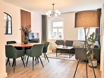 Ein Sitzbereich in der Unterkunft Fynbos Apartments Deluxe, Balkon, historisch, Parkplatz