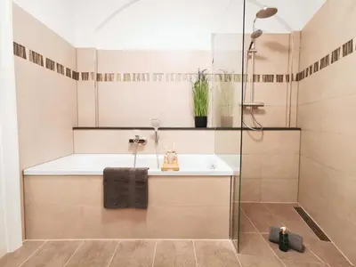 Ein Badezimmer in der Unterkunft Fynbos Apartments Deluxe, Balkon, historisch, Parkplatz