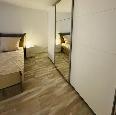 Ein Bett oder Betten in einem Zimmer der Unterkunft Fewo Reichenbrand
