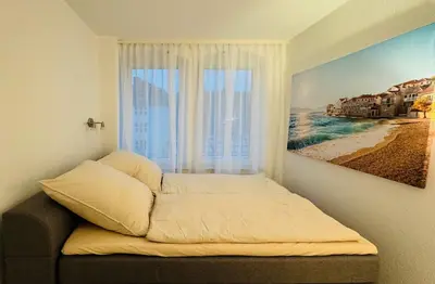 Ein Bett oder Betten in einem Zimmer der Unterkunft Fewo Reichenbrand