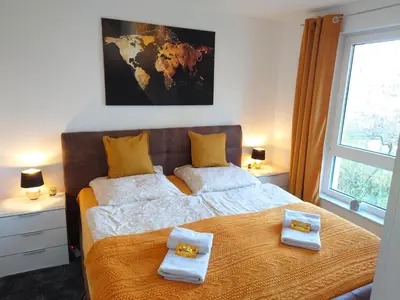 Ein Bett oder Betten in einem Zimmer der Unterkunft GinkgoTraum