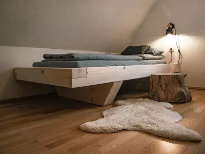 Ein Bett oder Betten in einem Zimmer der Unterkunft Ferienhaus Oelsener Höhe
