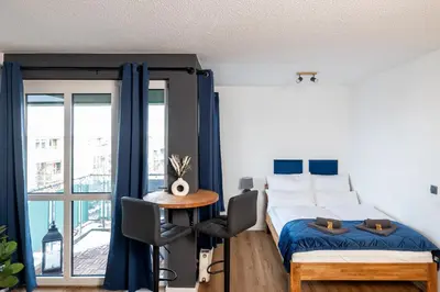 Ein Bett oder Betten in einem Zimmer der Unterkunft Sunnybelle Appartements Dresden I