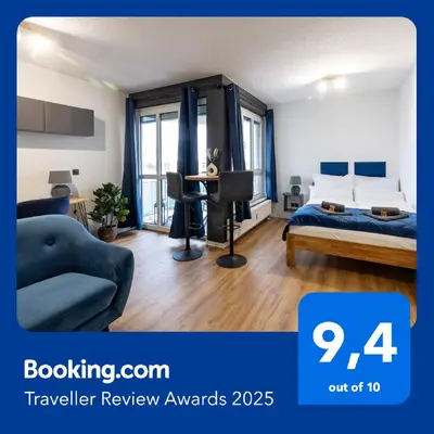 Ein Bett oder Betten in einem Zimmer der Unterkunft Sunnybelle Appartements Dresden I