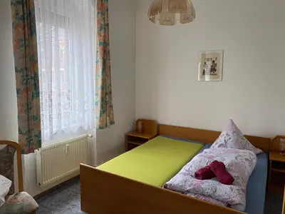 Ein Bett oder Betten in einem Zimmer der Unterkunft Hotel Stadt Leipzig