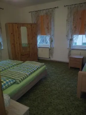 Ein Bett oder Betten in einem Zimmer der Unterkunft Hotel Stadt Leipzig