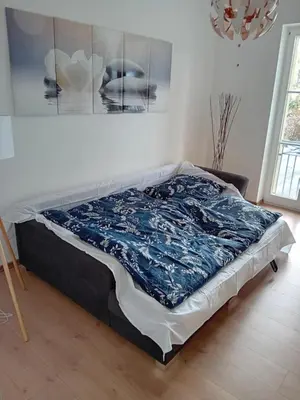 Ein Bett oder Betten in einem Zimmer der Unterkunft fambiwo - Top Ferienwohnung in sehr guter Lage