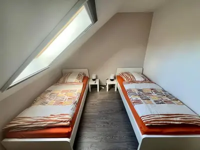 Ein Bett oder Betten in einem Zimmer der Unterkunft Schöne Ferienwohnung im Grünen