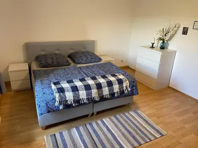 Ein Bett oder Betten in einem Zimmer der Unterkunft Idyllisches Wohnen zur Bergmühle