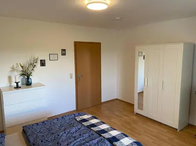 Ein Bett oder Betten in einem Zimmer der Unterkunft Idyllisches Wohnen zur Bergmühle