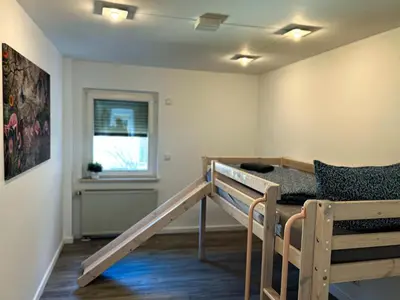 Ein Bett oder Betten in einem Zimmer der Unterkunft Ferienhaus Wachwitzgrund