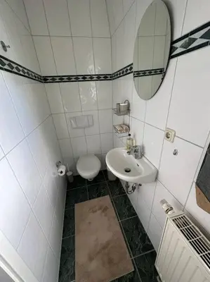 Ein Badezimmer in der Unterkunft Charmantes Zimmer in Dresden OT Langebrück