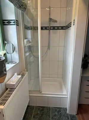 Ein Badezimmer in der Unterkunft Charmantes Zimmer in Dresden OT Langebrück